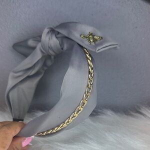 Elegant Gray Headband with Gold Chain Accent